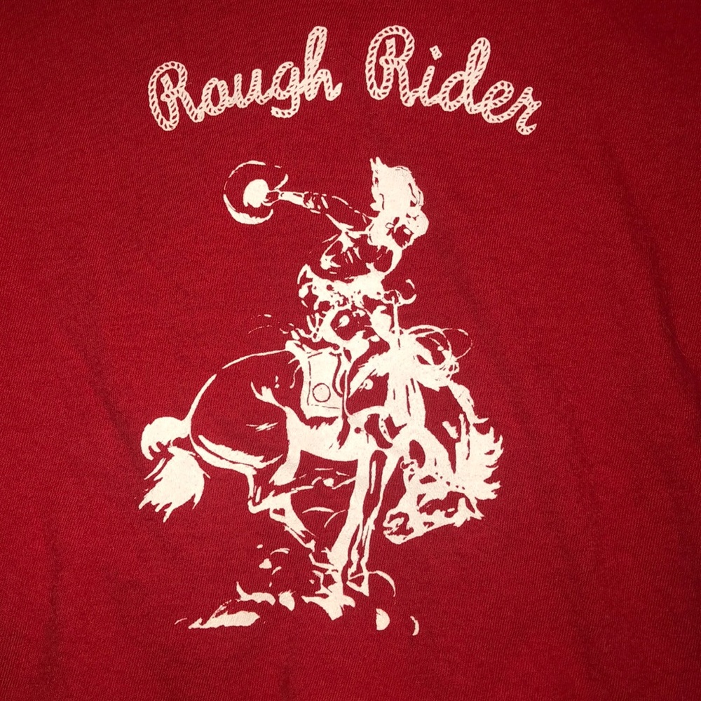 Red “rough rider” John galt crop top
